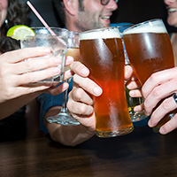 Group enjoying beer at Brunswick Sports Grill and Bar